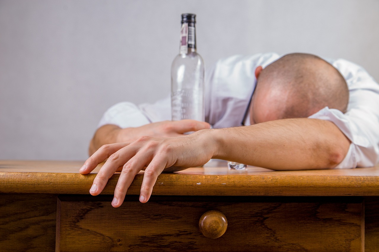 man hungover from alcohol